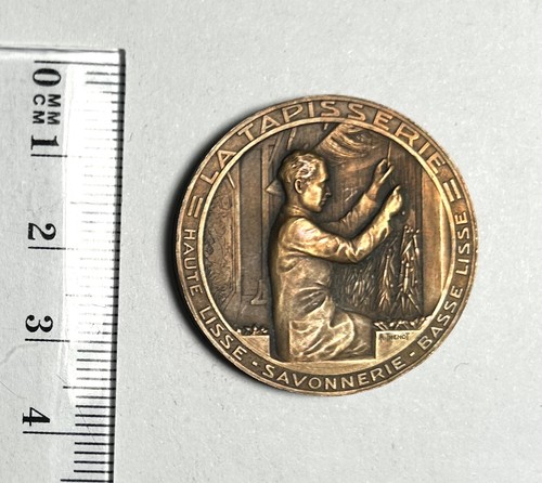 Médaille tapisserie - la,